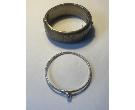 TWO SILVER BANGLES 
