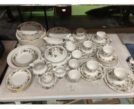 A ROYAL DOULTON 'LARCHMONT' DINNER SERVICE, TO INCLUDE VARIOUS SIZES OF PLATES, A SERVING TUREEN AND BOWLS, SAUCE BOAT WITH S