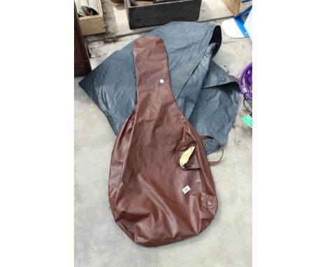 A GUITAR CARRY CASE AND A TARPAULIN SHEET 