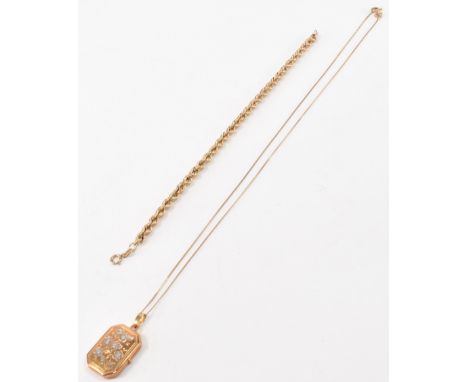 A 9ct gold locket pendant with a gold necklace together with a 9ct gold bracelet. The necklace having a two tone gold locket 