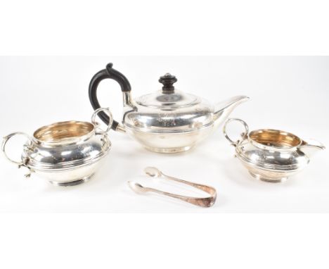 An Edwardian early 20th century sterling silver hallmarked tea set with fitted box. The lot to include one tea pot with eboni