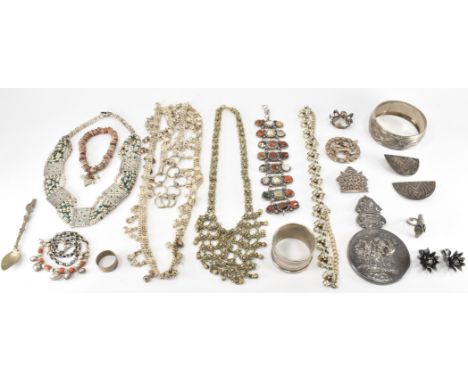 A collection of mixed white metal jewellery. The lot to include a white metal and blue stone collar necklace, Indian chain ne