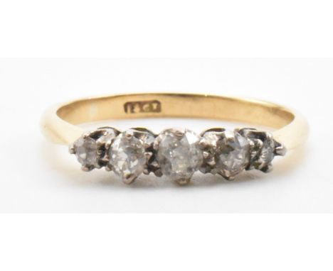 &nbsp;An 18ct gold diamond half hoop ring. The ring set with five graduated old cut diamonds. Estimated diamond weight 0.43ct