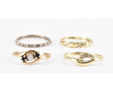 Three gold rings together with a white metal ring. The lot to include a vintage 9ct gold hallmarked three stone ring. The rin