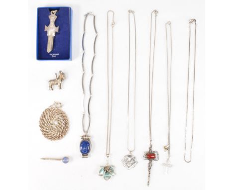 A selection of vintage silver and white metal jewellery to include a heavy Aries charm/pendant, silver cross key pendant on a