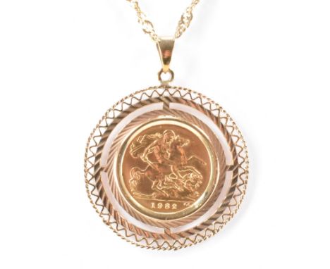 A 1982 mounted sovereign on a gold chain. The sovereign mounted in an open circular pendant on a twist design necklace. Penda