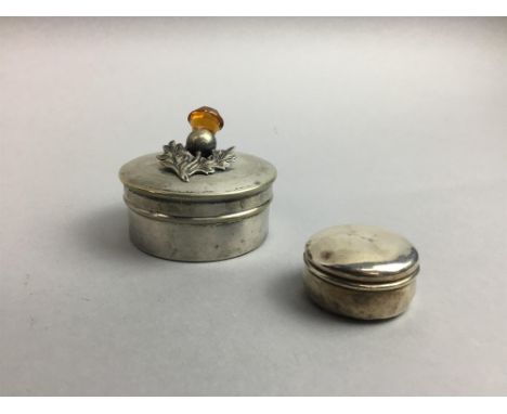 SILVER PILL BOX, along with another pill box with thistle motif finial, other silver plated items including souvenir spoons a