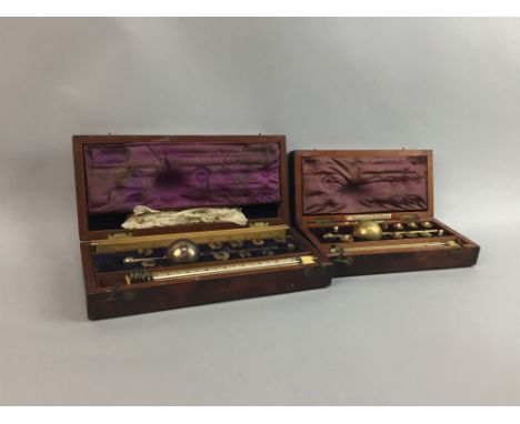 TWO SIKES HYDROMETERS, in mahogany cases, a Matrix Micro-Maag, in box and a set of gram weights (4)
