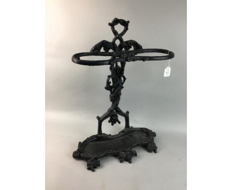 CAST IRON STICK STAND, modelled with vine decoration, 62cm high