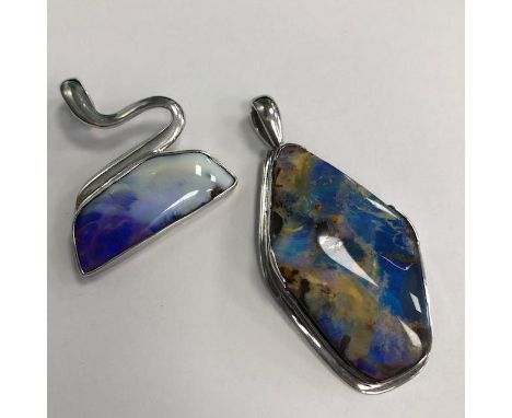 TWO OPAL PENDANTS, set in silver