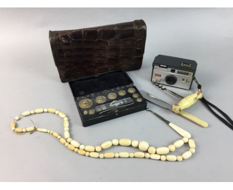 LADY'S LEATHER CLUTCH BAG, along with other collectable items including a camera, cased set of weights, etc