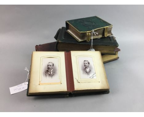 FOUR VICTORIAN PHOTOGRAPH ALBUMS, containing portrait studies (4)