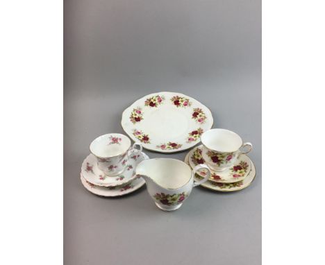 RICHMOND FLORAL AND GILT DECORATED TEA SERVICE, comprising six trios, cream, sugar and sandwich plate, along with a Queen Ann