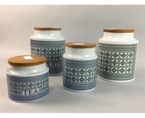 FIVE HORNSEA STORAGE JARS, three 20cm high, one 11cm high and one 15cm high, along with four Hornsea cups