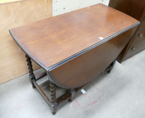 20th Century oak drop leaf gate leg barley twist table 