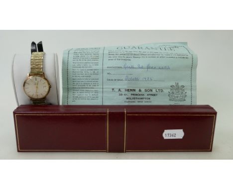 9ct gold gents Henn wrist watch 1976: on gold plated expanding bracelet, 33mm wide excl. button. Not working.