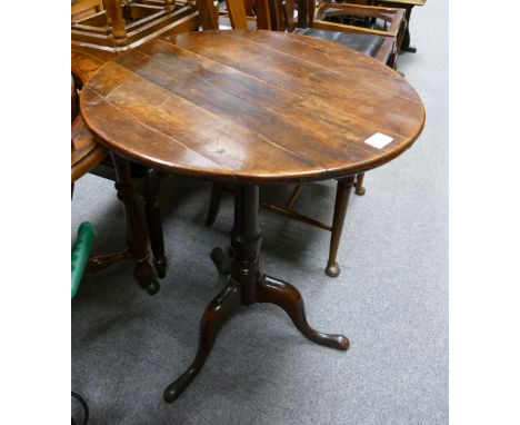 Georgian oak tripod table (several splits to the top) 