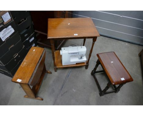 A small selection of oak 20th century furniture to include a side table, drop leaf side occasional/side table, stool and Toyo