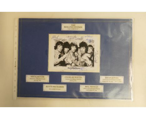 Two large signed photographs of the Beatles &amp; Rolling Stones, these two items are NOT believed to be genuine signatures o