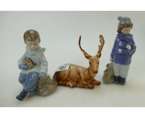 Nao figures of young boys together with Beswick Stag lying 954(3)