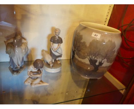 A Royal Copenhagen planter together with three Royal Copenhagen figures (planter and one figure af)
