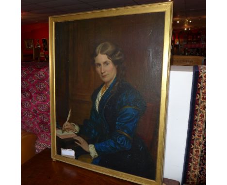 A 19th century oil on canvas portrait of a lady, in a gilt frame 