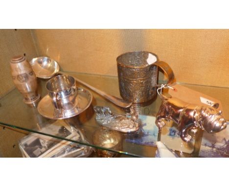 A collection of silver plated items including an Art Deco pepperette, a bulldog figure, an Indian mg, a ladle and others