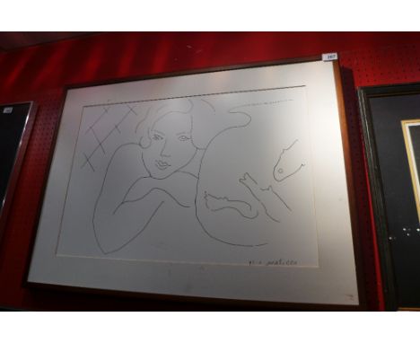 A framed Matisse print, portrait study 