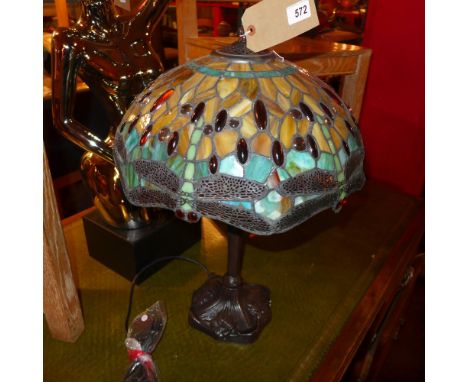 A Tiffany style table lamp with leaded coloured glass shade 