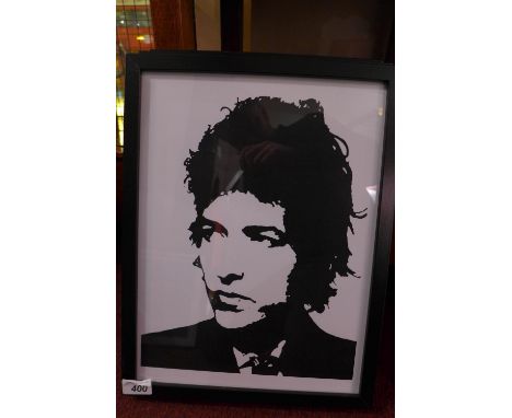 A glazed and framed art print featuring Bob Dylan