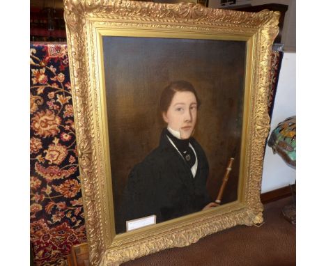 A 19th century oil on canvas portrait of a gentleman, in an ornate gilt frame