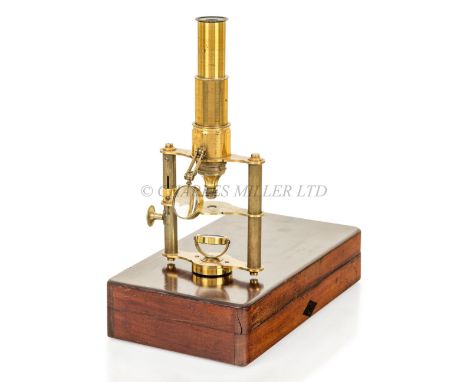 A PORTABLE MONOCULAR MICROSCOPE, 19TH CENTURY constructed in lacquered brass with the 5in. tube supported on two pillars with