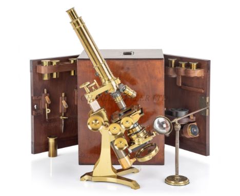 A FINE MONOCULAR COMPOUND MICROSCOPE BY ANDREW ROSS, LONDON, CIRCA 1858heavily constructed in lacquered brass, signed on the 