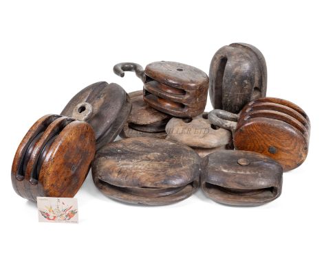 EIGHT FULL SIZE ASSORTED SHIPS' BLOCKS, PROBABLY 19TH CENTURYheavily constructed in oak, some with with spools, assorted patt