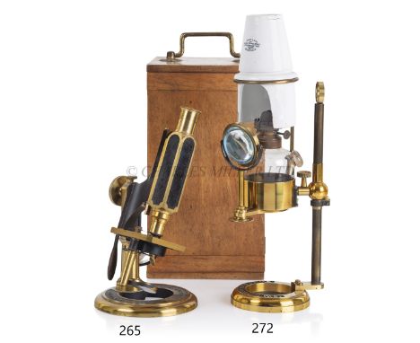 A MICROSCOPE LAMP BY J. SWIFT &amp; SON, CIRCA 1880constructed in lacquered brass and signed on the circular foot as per titl