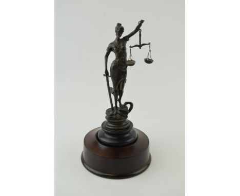 A bronze metal figure of Justice, Paris maker, 'Bronze Garanti Paris' Height 23cm. On wooden plinth that fits well although i