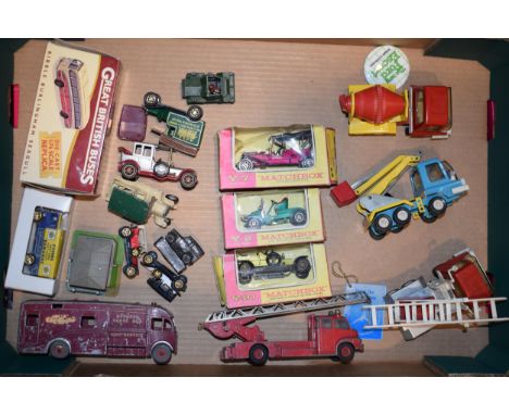 A mixed collection of vintage model die cast vehicles to include boxed Matchbox 'Models of Yesteryear', Tri-ang tin toys, Din