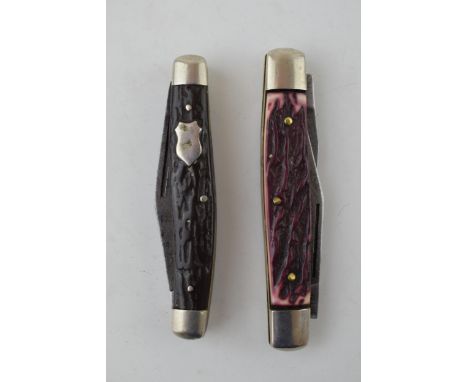 Two vintage I XL George Wostenholm Sheffield penknives one thee blades and one with two blades. Length 10cm. When open 17cm. 