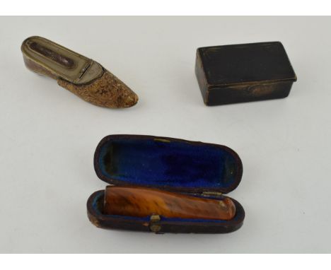 A collection of items to include an cased amber cigar holder, paper mâché snuff box and a vesta case in the form of a shoe. (