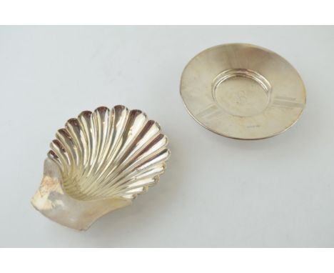 A silver Walker and Hall Art Deco small pedestal dish, engraved, Sheffield 1955, with a silver shell dish, Birmingham 1906, (