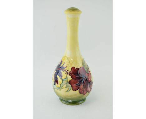 Moorcroft lamp base in the Hibiscus pattern. signed WM in pen to base with 'By Appointment W. Moorcroft Potters to Queen Mary