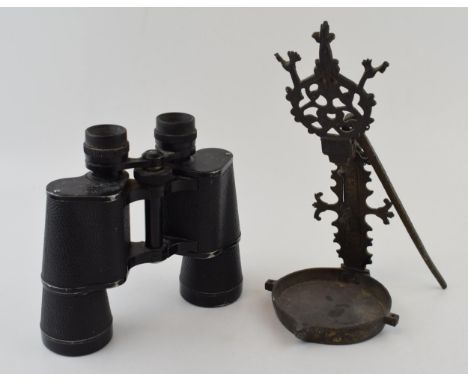 A pair of Zuiho 10 x 50 coated lens binoculars with an early 20th century cast brass kandil lamp / betty / cruise lamp, Moroc
