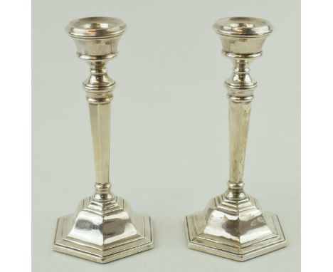 A pair of silver candle sticks, hallmarked Birmingham 1970 S&amp;M. Gross weight 292.9 grams. Height 16cm.  