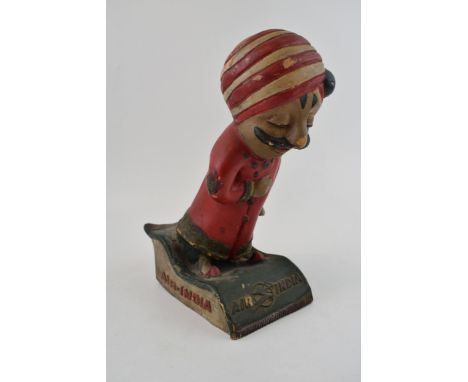 Vintage 'Air India' rubberoid advertising figure, 24cm tall.  Some loss to paint, split to underside of base.