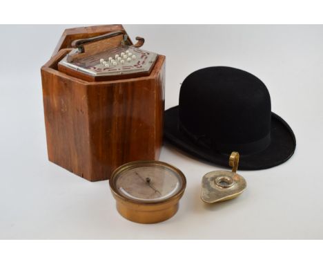 An I L Evans of Hanley bowler hat with a vintage wooden cased squeeze box, a silver topped candlestick and a wall hanging ane