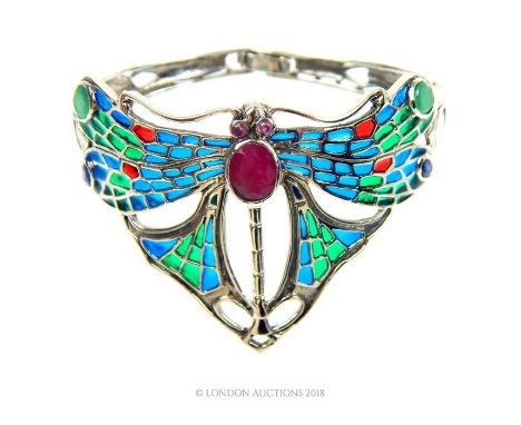 A sterling silver, plique a jour cuff bangle in the Art Nouveau style in shades of blue and green and studded with one facete