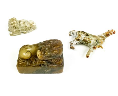 An antique Chinese jade seal, carved with a kylin, 5 x 6  x  3cm, together with a Chinese glass figure of a horse (one leg br