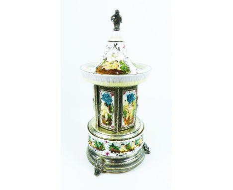 A large, vintage musical box and cigarette dispenser with hand-painted ceramic panels possibly by Capodimonte with white meta