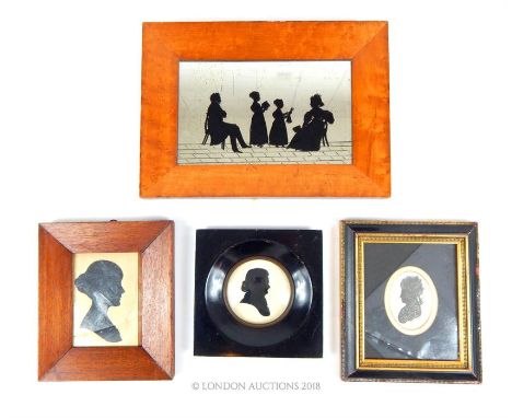 Victorian figural group silhouette on glass, 13x22cm, maple framed, together with three Victorian portrait miniature silhouet