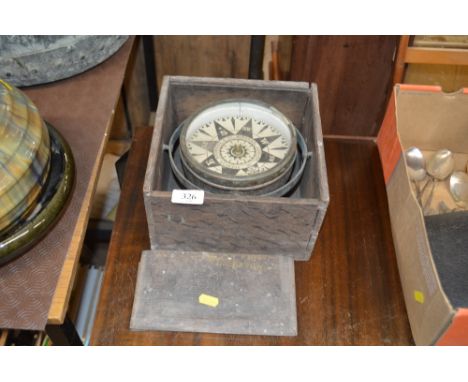 A ships compass by Spencer Browning &amp; Co. London